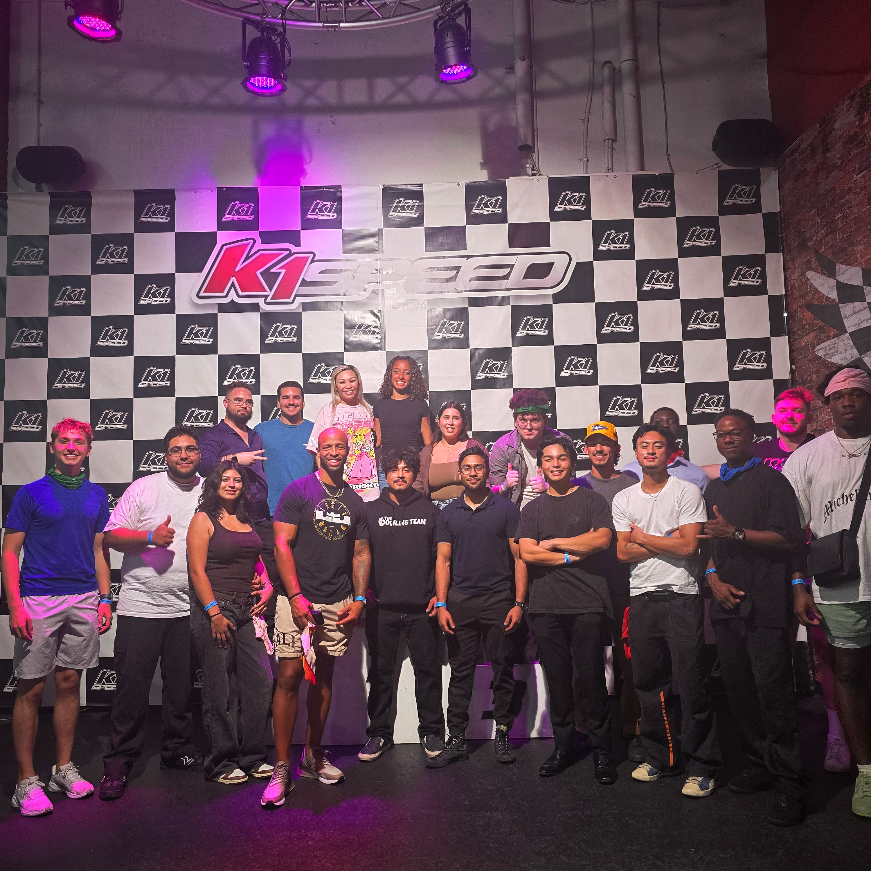 True Vision team members racing go-karts and celebrating at K1 Speed Irvine