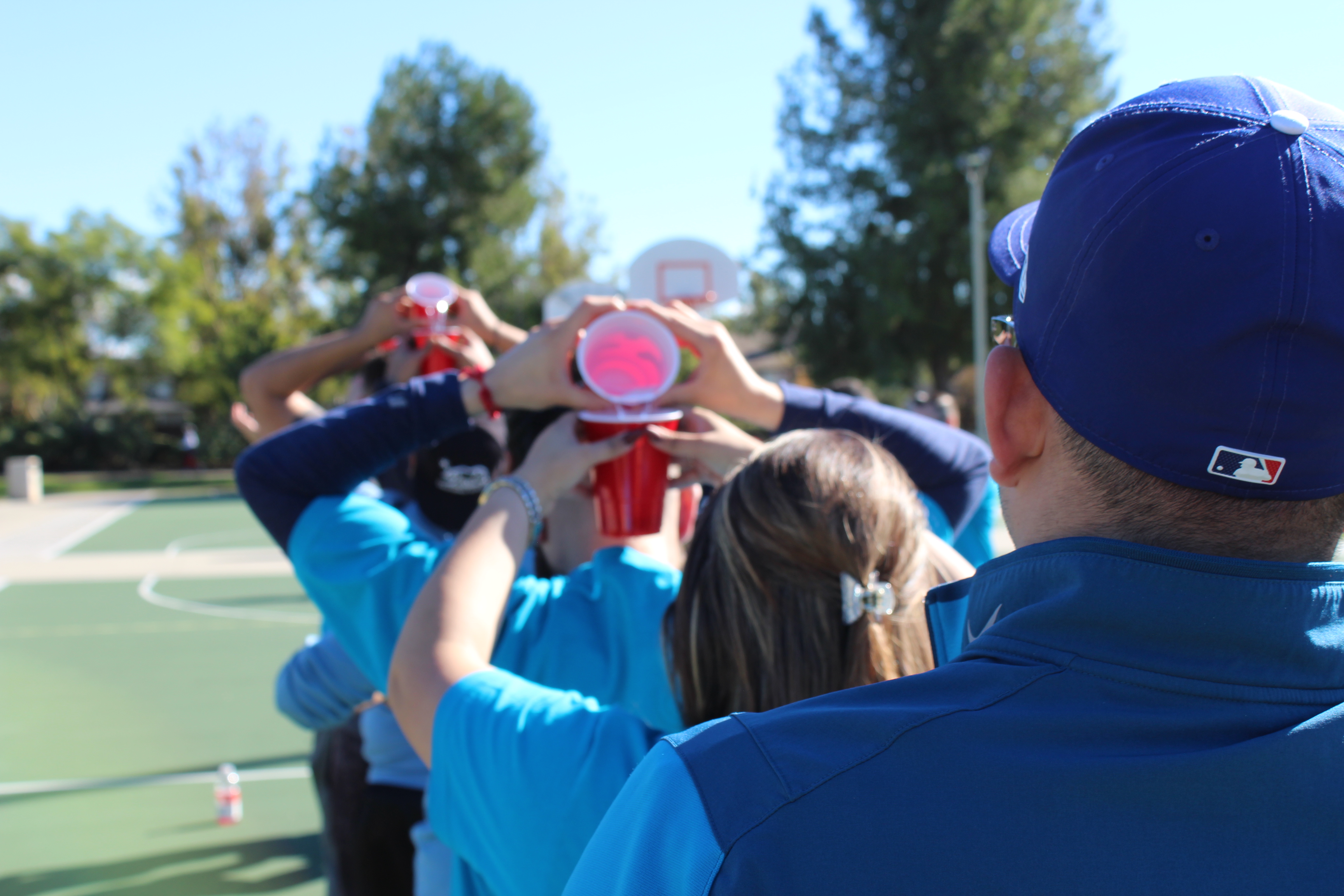 True Vision team members participating in outdoor team-building activities during the 2018 Field Day event